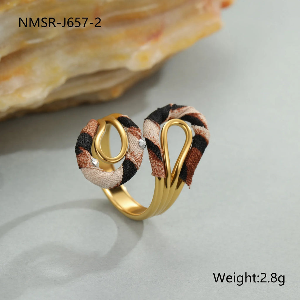 Open mouth ring with geometry heart star shapes and leopard print pattern in electroplated stainless steel