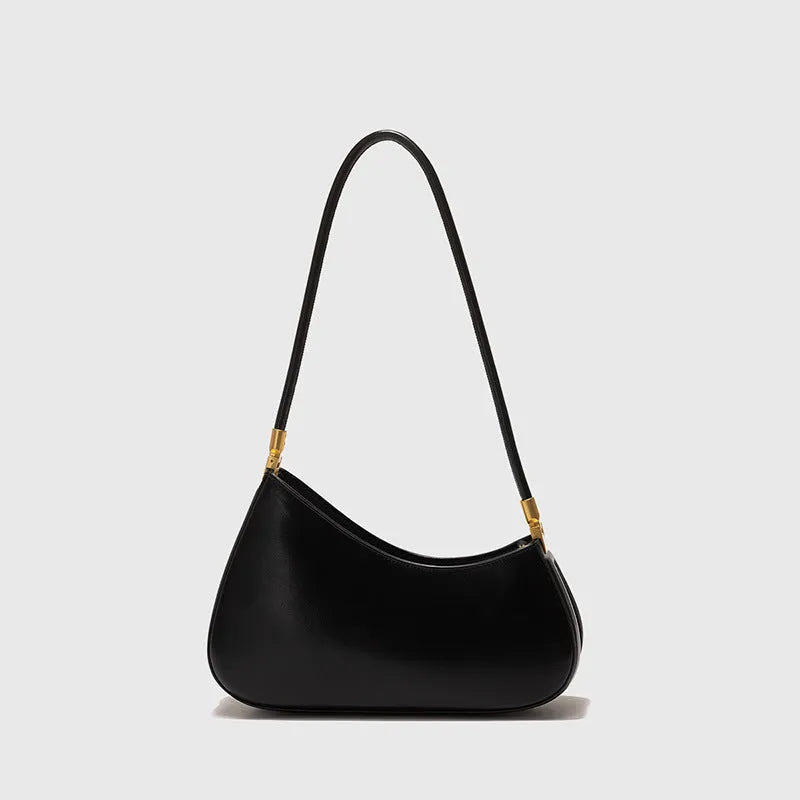Women's retro oval PU leather shoulder bag in seven colour options with single strap and internal zipper compartment