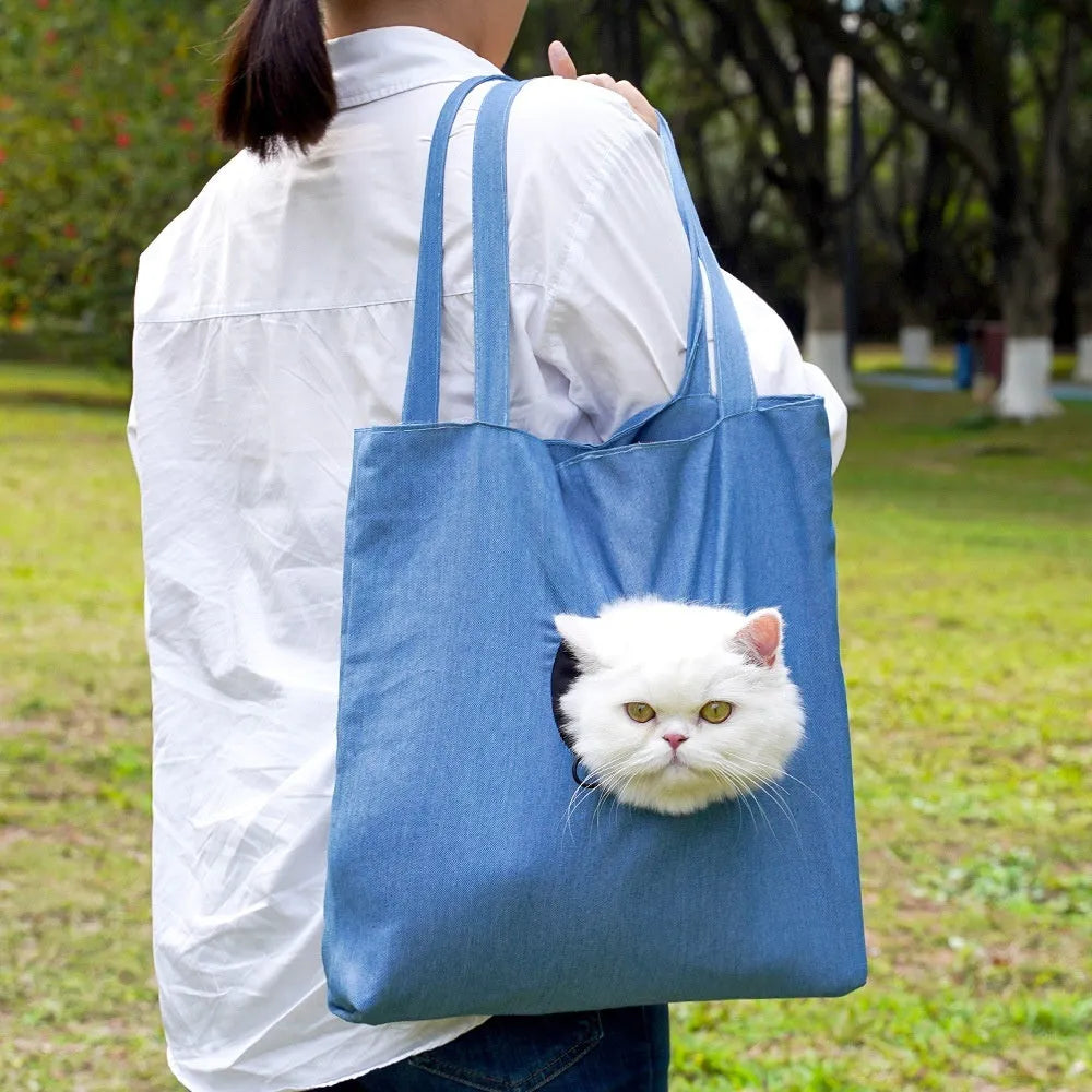 Soft canvas pet shoulder bag with cartoon pattern for small dog or cat carrier.