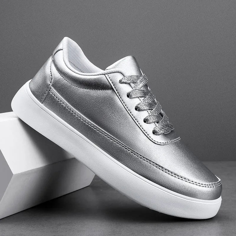 Women's white leather casual flat lace-up shoes on a light background, showing the front and side profile.