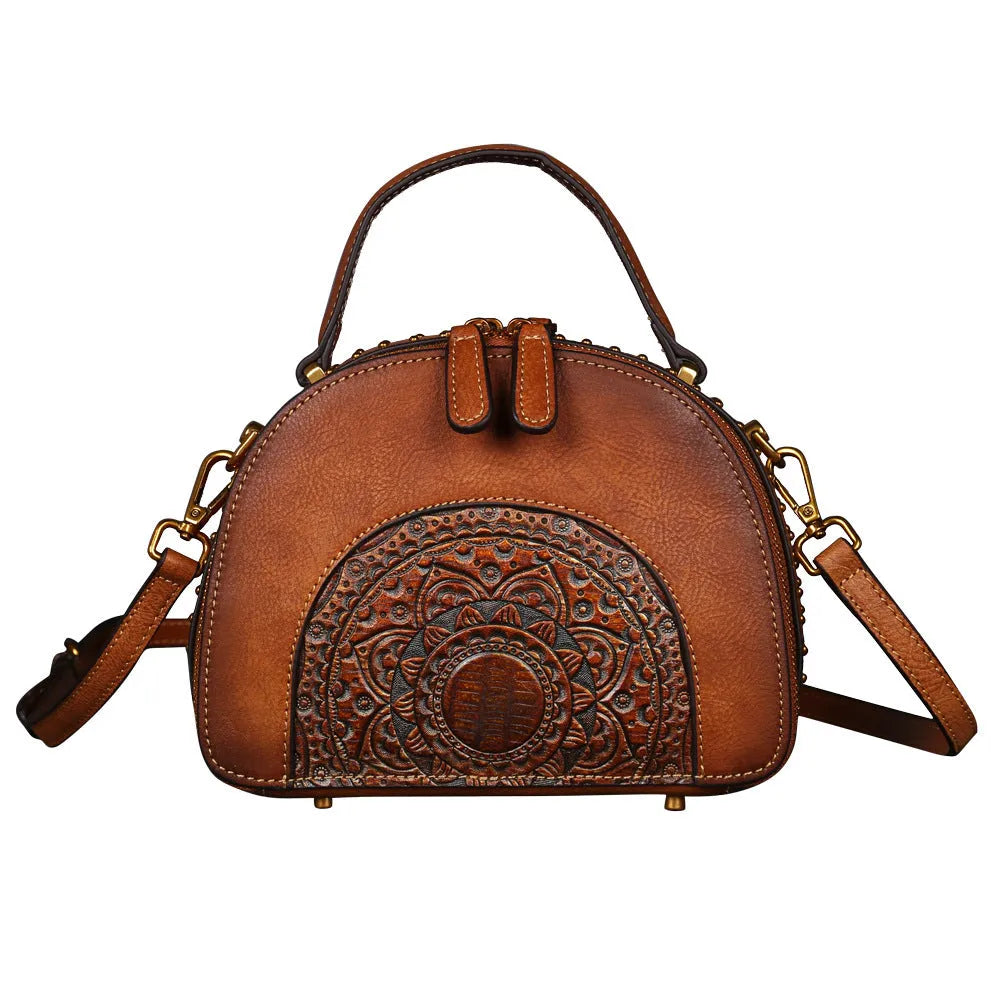 Vintage cowhide leather handbag with suede accents showing interior compartments including ID bag and mobile phone pocket