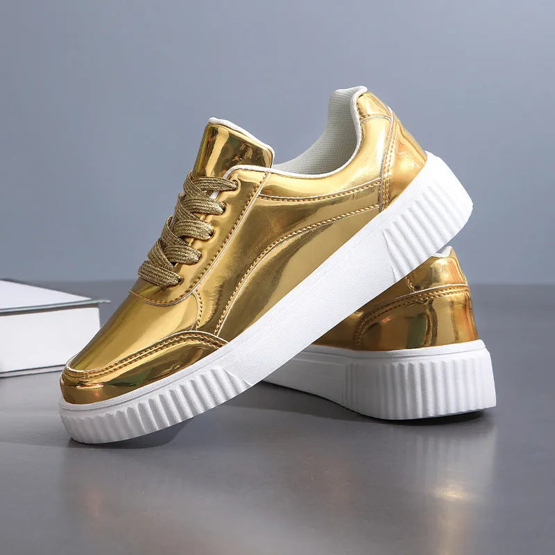 Gold sequinned platform sneaker with round toe and thick MD sole.