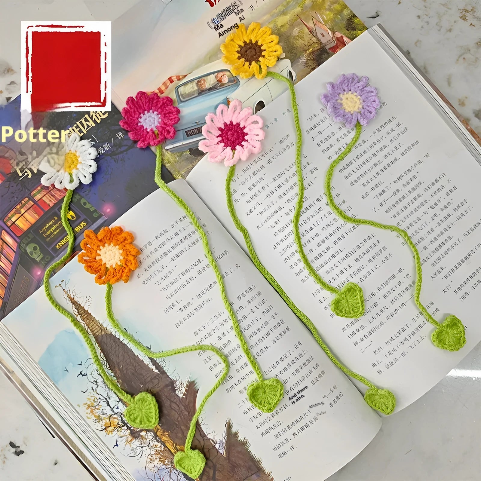 Hand-crocheted daisy flexible wire bookmark in yellow, pink, light purple, and orange colours.
