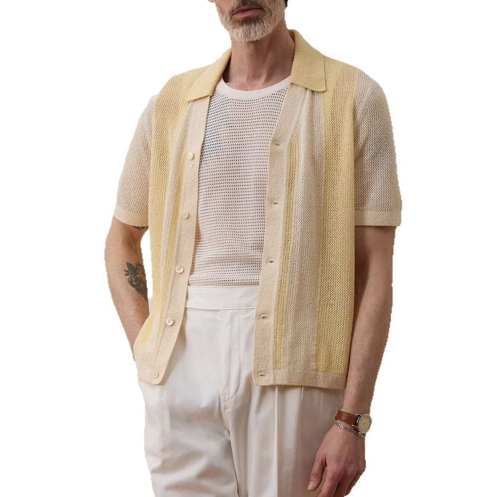 Yellow women's Tencel polo shirt with an asymmetric hemline and hollow-out detail on a short sleeve.