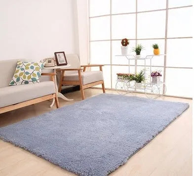 Rectangular solid colour carpet with velvet surface showing non-slip dot patterned bottom layer