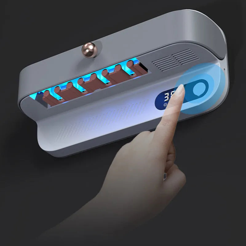 White wall-mounted smart toothbrush steriliser holder with UV light and USB charging port.