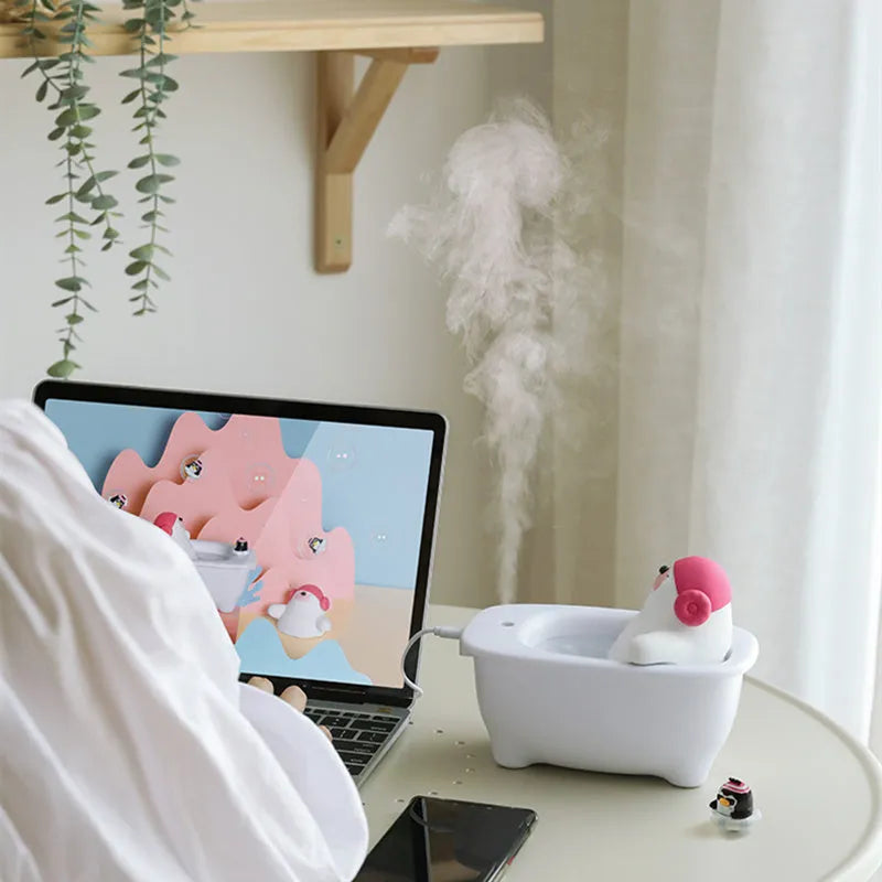 White USB-powered desktop air humidifier with water tank and mist output
