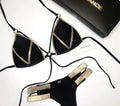Women's black padded bikini swimsuit without underwire on a mannequin