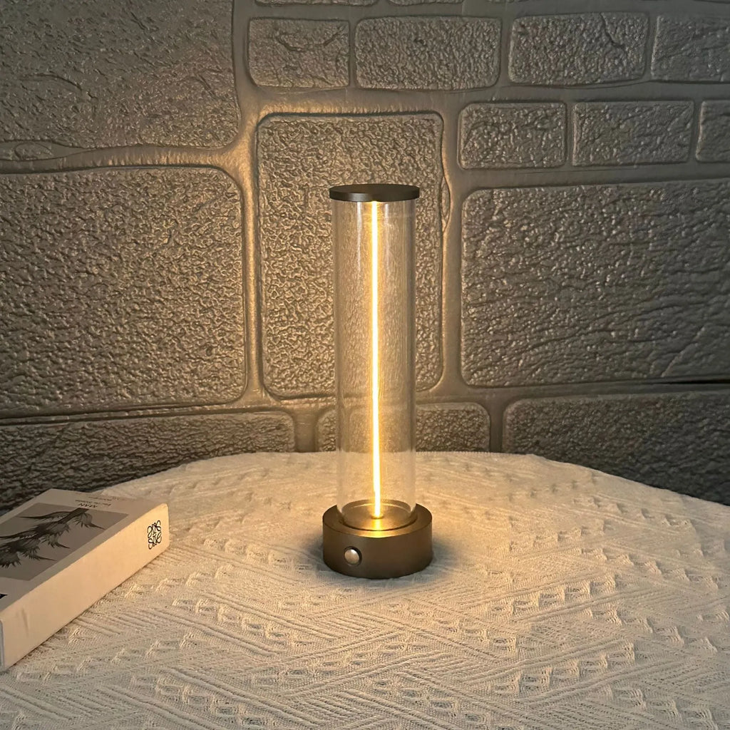 Modern white glass LED line light with magnetic base for USB rechargeable accent lighting