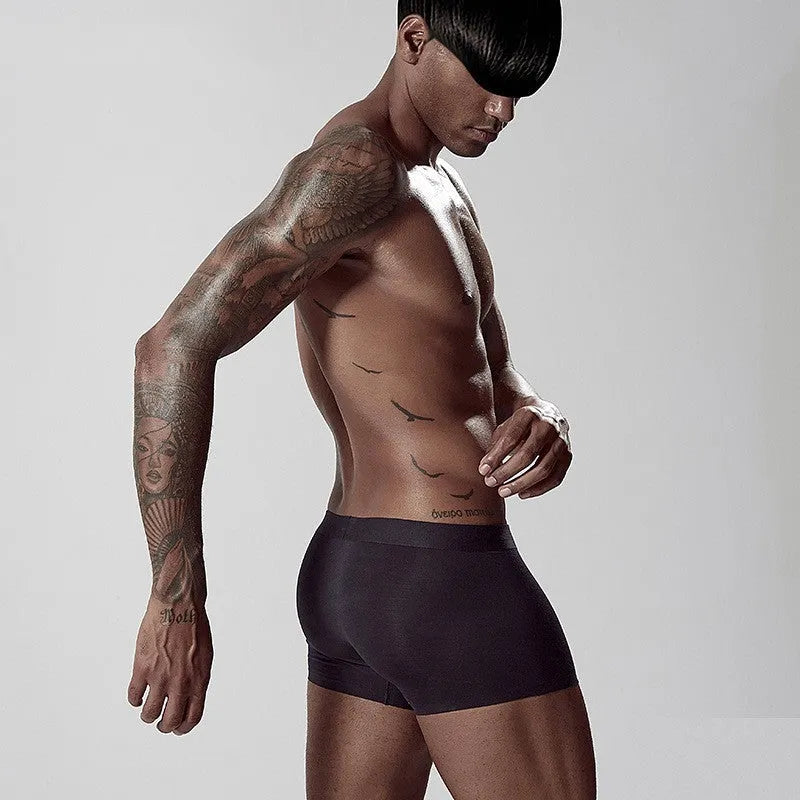 Men's modal seamless underwear in green colour showing mid waist design and solid pattern