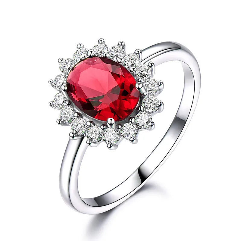 Women's copper floral ring with inlaid zirconium detail in green, blue, or red.