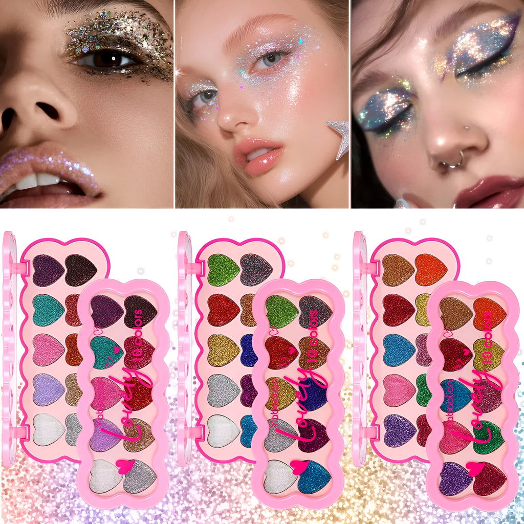 Heart-shaped case open to show ten eyeshadow pans in white, beige, pink, purple, brown, blue, black, royal blue, maroon, and coral.
