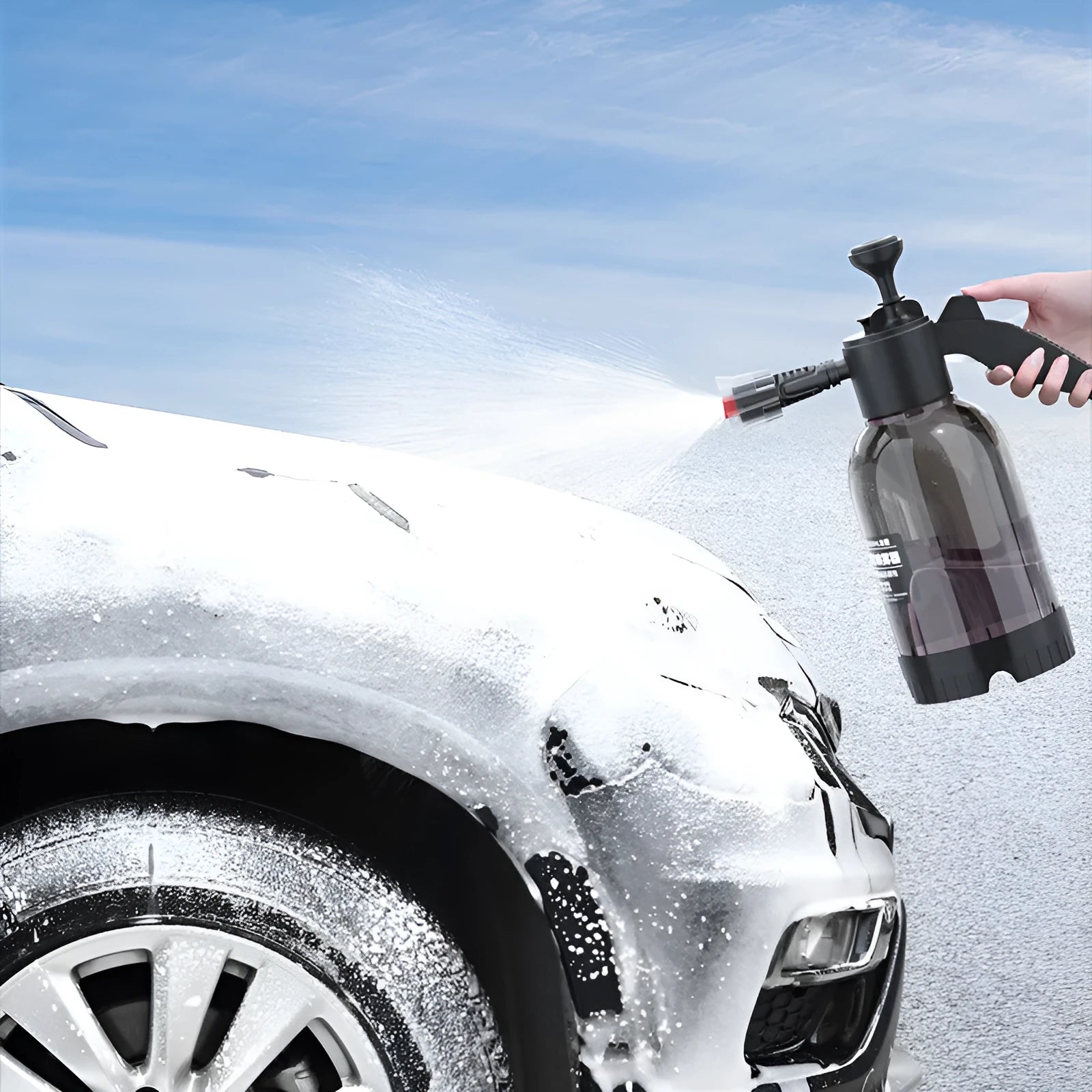 Black plastic 2-litre foam watering can sprayer with handle and spray nozzle.