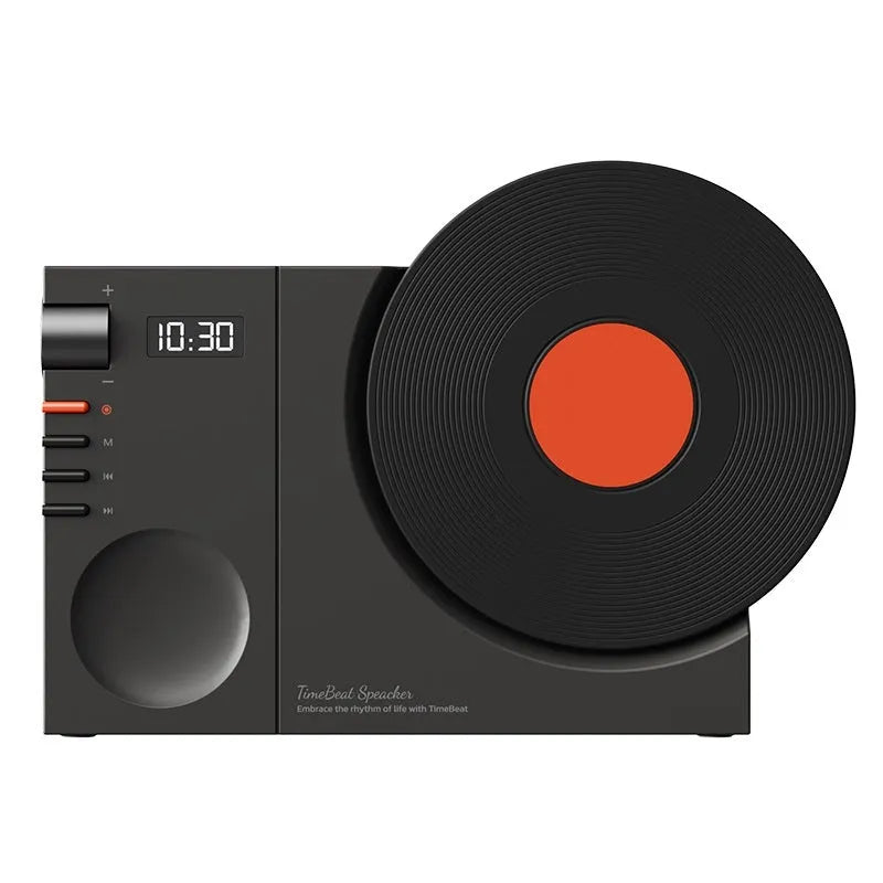 Mini portable Bluetooth speaker in Obsidian Black, Ivory White, Coral Pink, or Plum Green with USB charging port