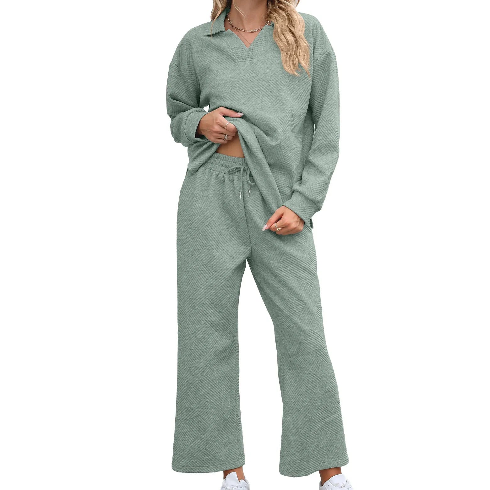 Women's knitted jacquard two-piece suit with geometric pattern detail in solid colour with long sleeves and elastic waist trousers