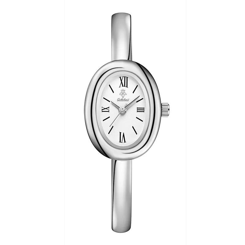 Women's oval retro quartz watch with 8mm thickness showing gold and silver colour options with spiral patterns
