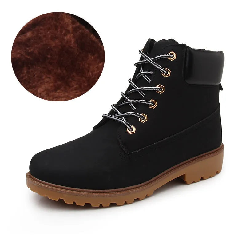 Men's pink Martin ankle boots with velvet lining, round toe, flat sole, and front lace-up closure.