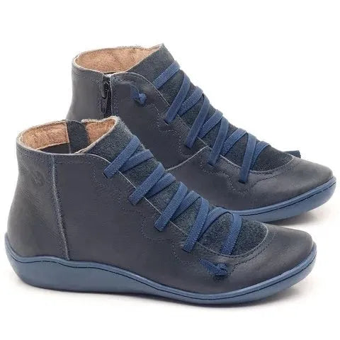 Women's black casual ankle booties with a flat wedge heel and round toe, made from PU with a rubber sole.
