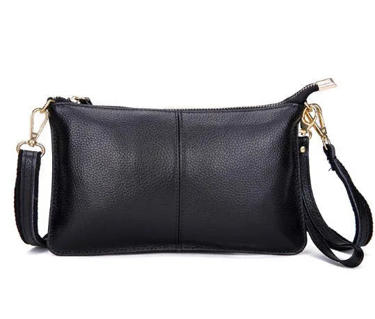 Lady cowhide slant bag in apricot showing top layer leather texture and dual straps