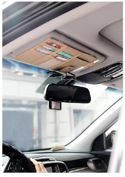Car sun visor clip in PU leather measuring 30x14cm, shown in black, with multiple storage slots