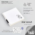 Small white square notebook with checkered pages and decorative sticker sheets