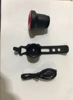 ENFITNIX Xlite100 bicycle taillight with 6061 aluminium chassis, mounted on seat rail, black body with red lens