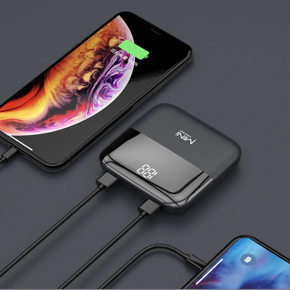 Portable 10000mAh power bank with digital display and dual USB outputs