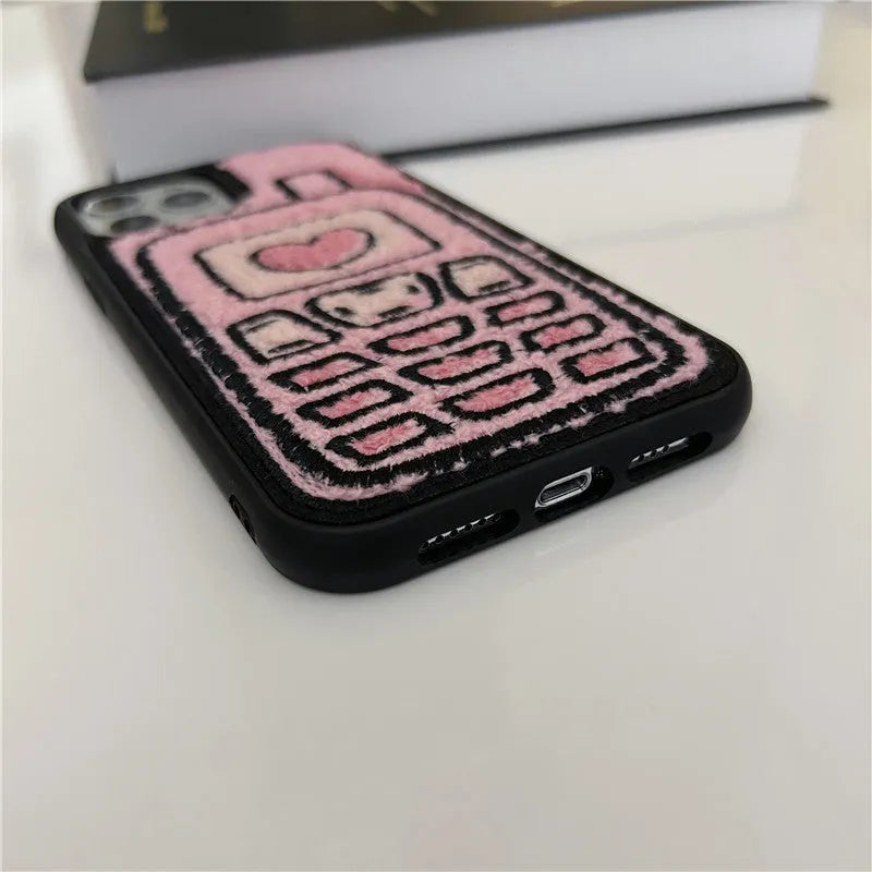 Pink TPU iPhone back case with a unique towel embroidery texture on the rear.