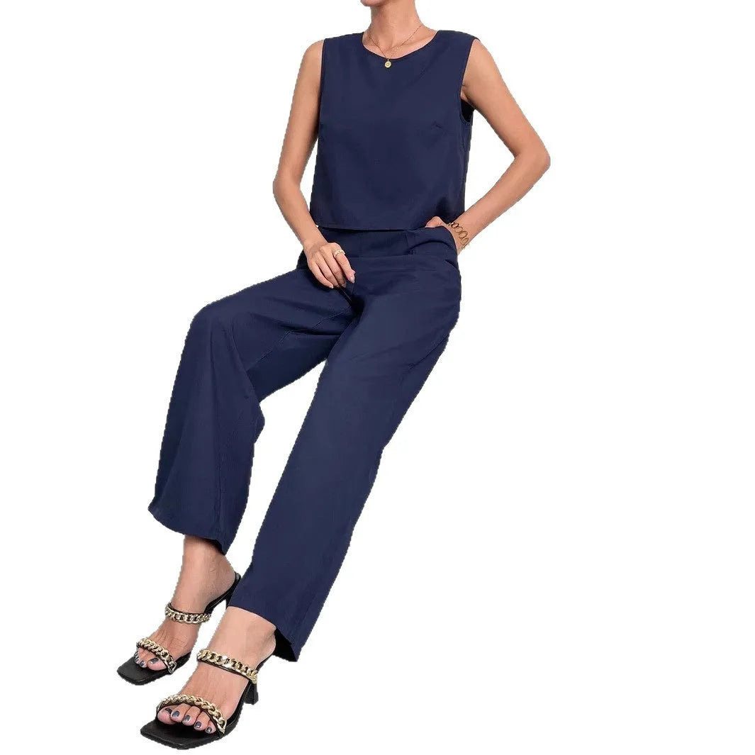 Red polyester two-piece women's set with sleeveless top and wide-leg trousers