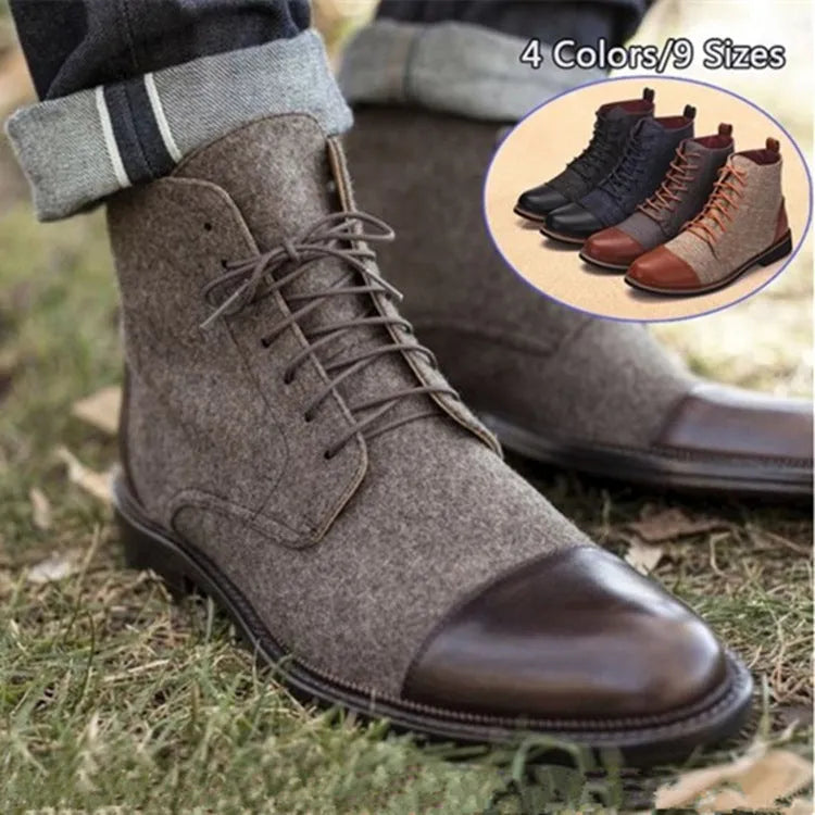 Men's black leather motorcycle-style boots with silver belt buckles on the side, featuring a thick rubber sole.