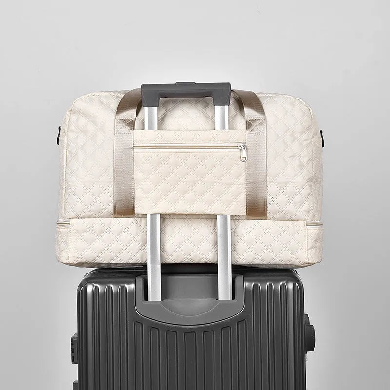 Oxford cloth portable large capacity travel bag in solid colour with 36-55L storage capacity