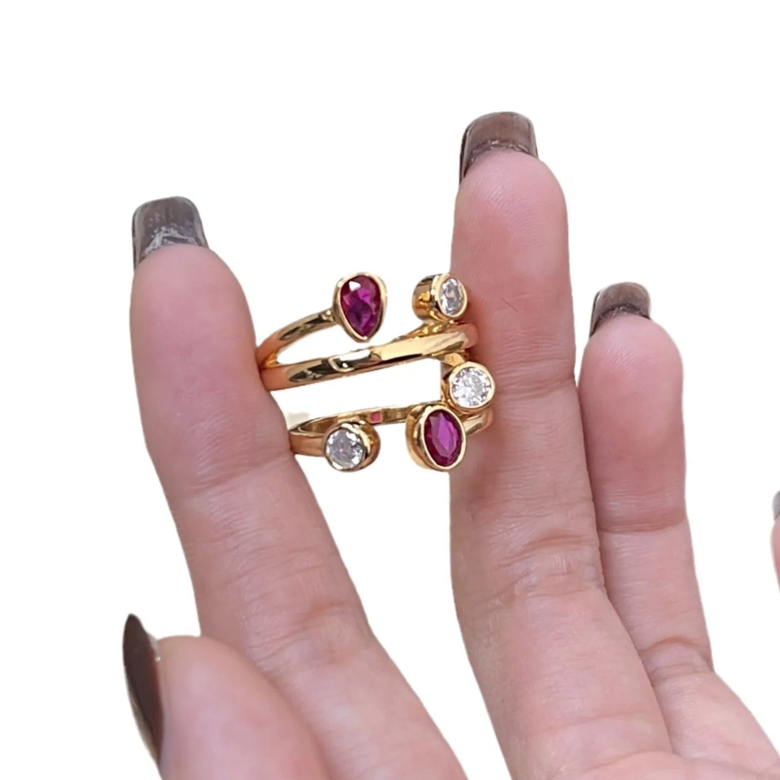 Irregular cross two-colour diamond ring with double-headed geometric design