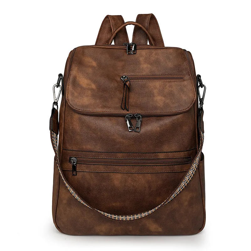 Retro college backpack in black PU leather with curved shoulder straps and stitching details