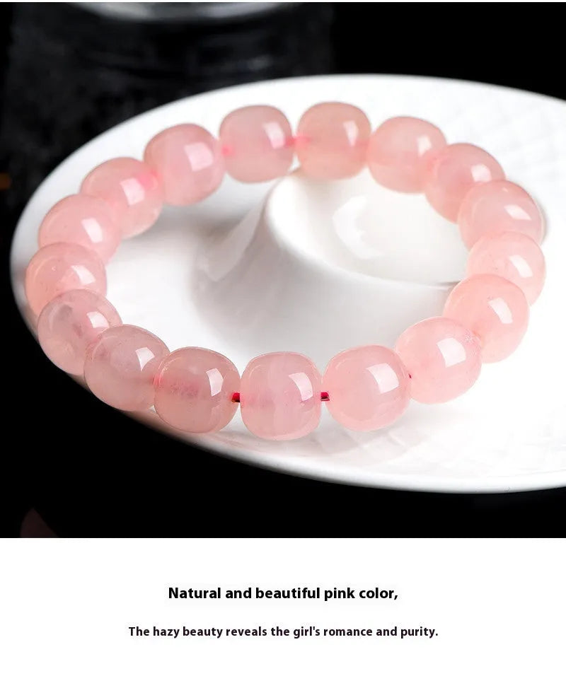 Pink crystal barrel bead bracelet with geometric design and 8 x 10mm bead sizing