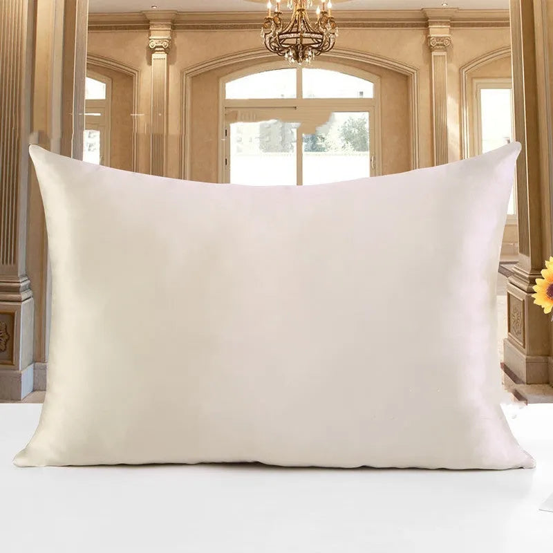 Double-sided silk pillowcase showing reversible design in apricot colour with three size options displayed