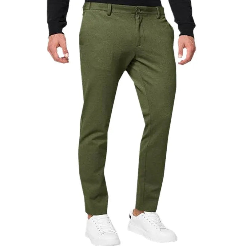 Men's slim-fit tapered chino trousers in stretch cotton blend fabric with pleated front detail