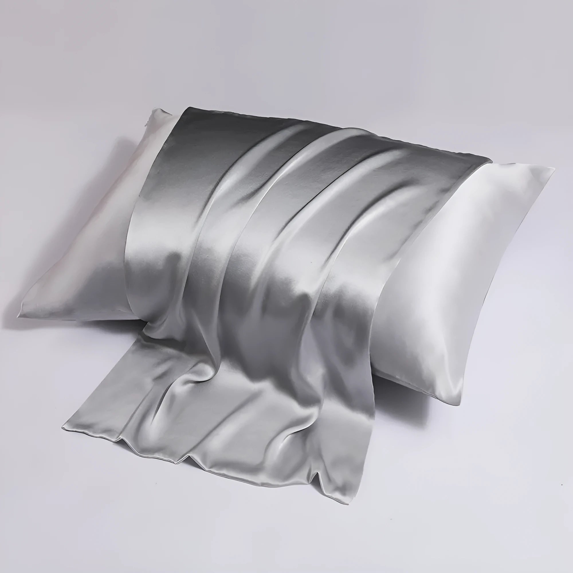 Double-sided silk zipper pillowcase in multiple colour options showing reversible design