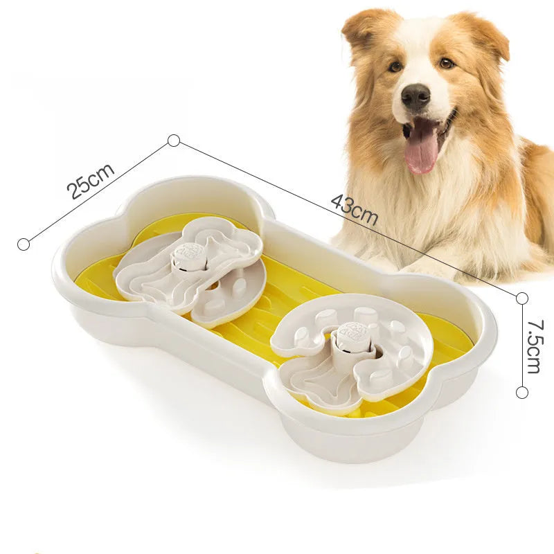Large green slow feeder dog bowl with three rotating puzzle trays and non-slip suction cups on base