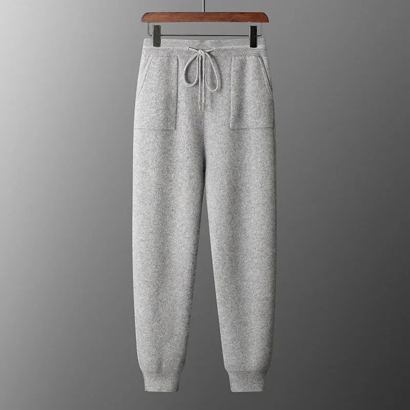 Men's light grey cashmere hooded sweatshirt and matching trousers leisure set on hanger