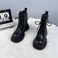 Women's thick-soled British-style leather boots with mid heel, lace-up front, round toe, rubber sole, black colour