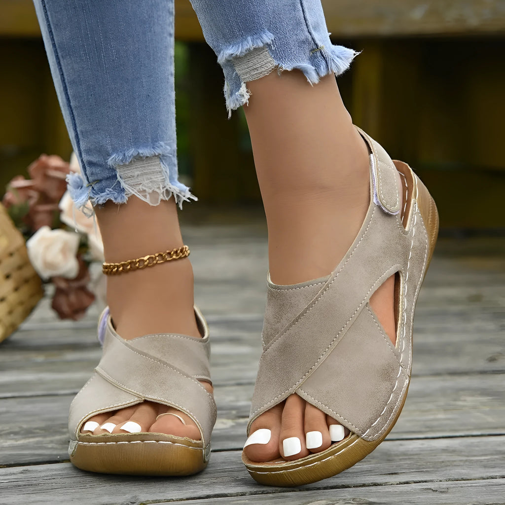 Roman platform sandals with decorative skirt and velcro closure in earth-tone colour