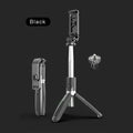 Black extendable Bluetooth selfie stick with tripod legs and wireless remote on a white background.