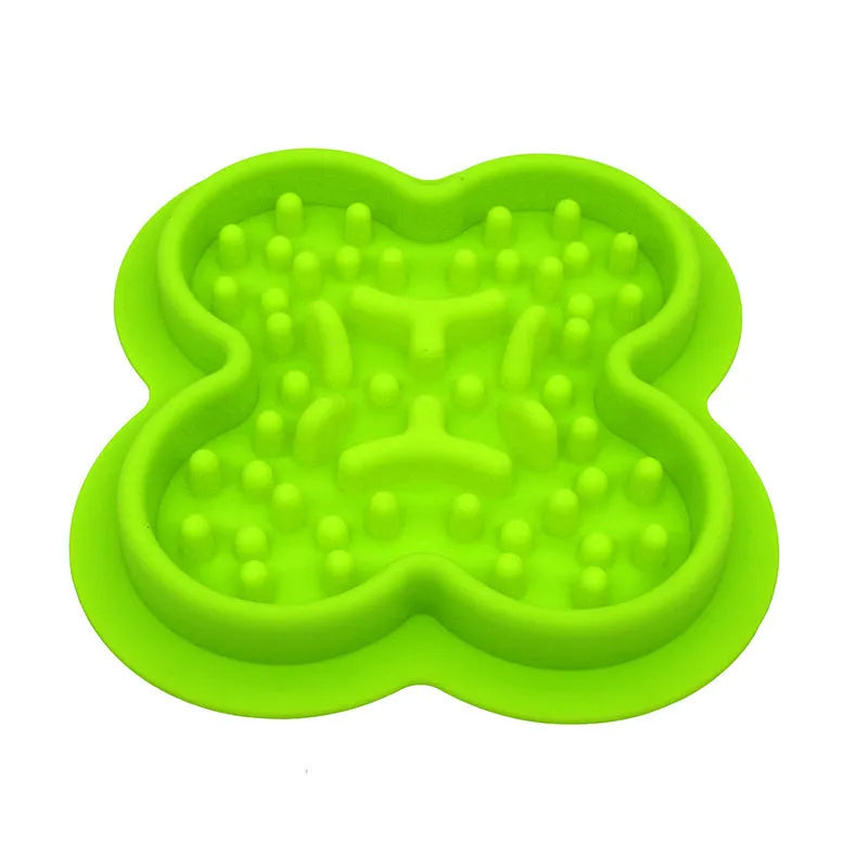 Blue silicone pet licking pad with textured surface and raised edges for slow feeding.