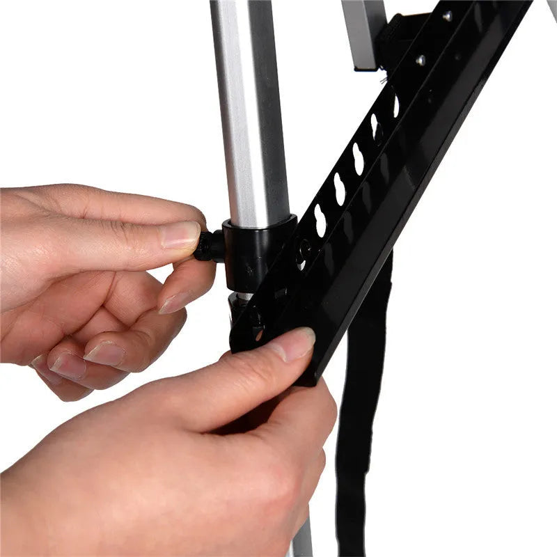Silver aluminium alloy adjustable painting easel on floor with canvas, folded length 21 inches