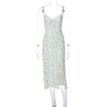 Women's blue long dress with white lace flower print, side slit, and thin adjustable suspender straps.