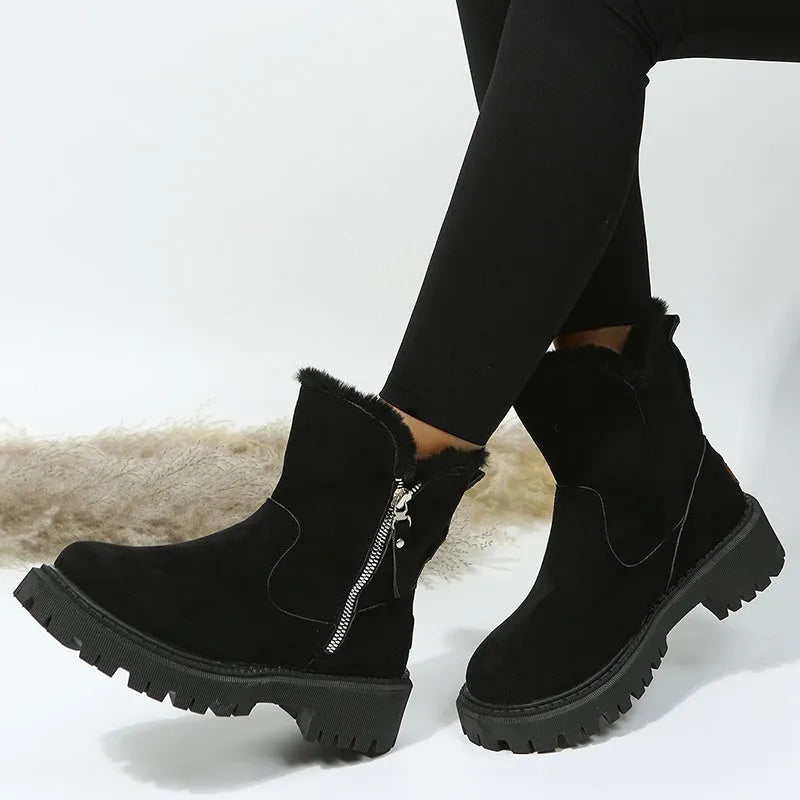 Women's black thick plush high-top snow boots with a side zipper and faux fur lining.