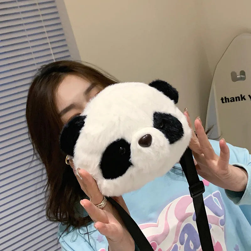 Plush crossbody shoulder bag with panda head pattern and cylindrical shape