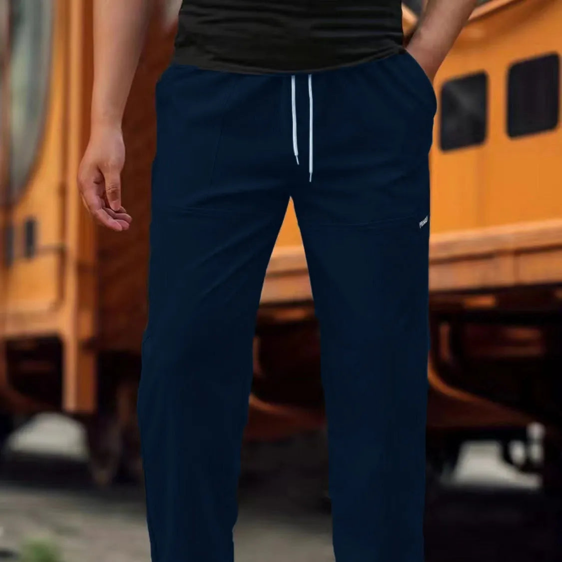 Men's polyester trousers for spring and autumn in light grey, available in sizes S to XXXL.