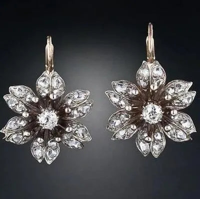 Women's retro fashion earrings in electroplated silver alloy with creative design elements