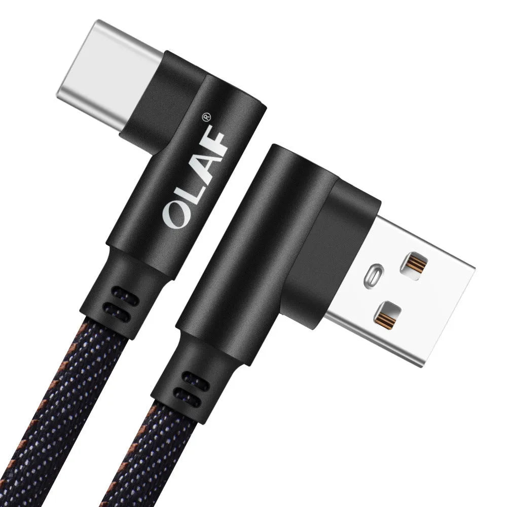 Fast charging USB cable with denim textile exterior and aluminium connectors in black, blue, and red.